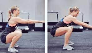 woman showing squatting exercise